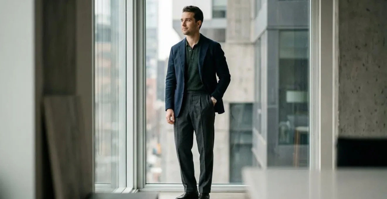 Editorial photograph showcasing contemporary men's fashion trends with sophisticated styling